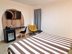 Postel nebo postele na pokoji v ubytování Hotel Aloe Emira NKC + 37 fotografií