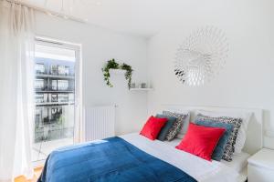 Postel nebo postele na pokoji v ubytování Apartamenty Homely Place Casa Verona - Stary Rynek - Parking