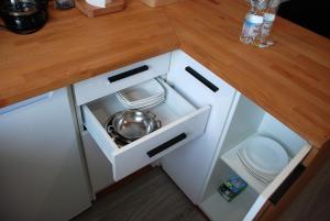 Kuchyň nebo kuchyňský kout v ubytování Apartament Legionow