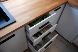 Kuchyň nebo kuchyňský kout v ubytování Apartament Legionow