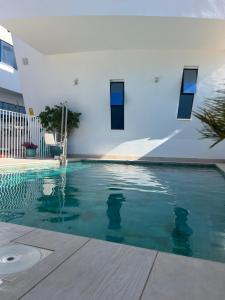 Bazén v ubytování Ancla Real Apartamentos Loft nebo v jeho okolí