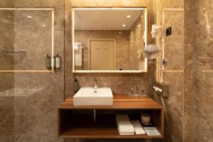 Koupelna v ubytování Hotel de Guimaraes Business & SPA