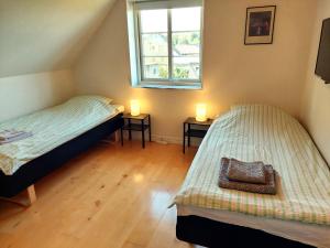 Postel nebo postele na pokoji v ubytování Johnnys Bed & Breakfast