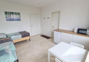 Posezení v ubytování ein Doppelzimmer und ein Dreibettzimmer bei Hamburg