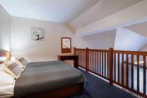Postel nebo postele na pokoji v ubytování Horský hotel Remata