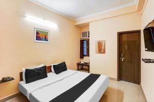 Μια τηλεόραση ή/και κέντρο ψυχαγωγίας στο Super Hotel O Jankipuram Vikas Nagar