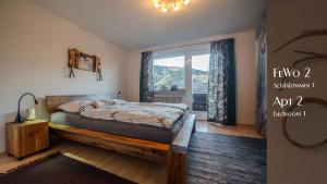 Postel nebo postele na pokoji v ubytování Ferienhaus Auschmiede