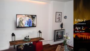 TV a/nebo společenská místnost v ubytování Ferienhaus Auschmiede