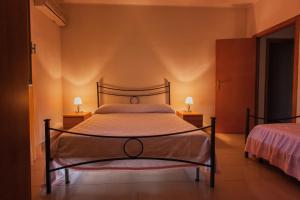 Кровать или кровати в номере Joanne B&B