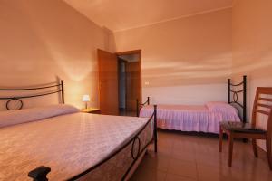 Кровать или кровати в номере Joanne B&B