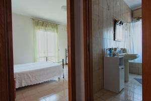 Кровать или кровати в номере Joanne B&B