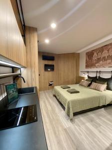 Ένα ή περισσότερα κρεβάτια σε δωμάτιο στο Apartament Officyna