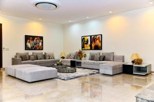 Χώρος καθιστικού στο Udman Luxe Villa Chattarpur
