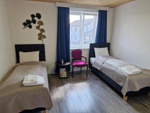 Łóżko lub łóżka w pokoju w obiekcie Apartment St. Pölten