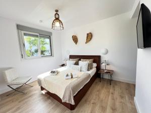 Postel nebo postele na pokoji v ubytování PUSHE Playa Granada Beach&Golf 4 + 27 fotografií