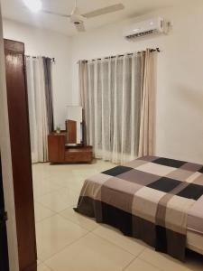 Apartment located 5 minutes from Ja Ela town客房内的一张或多张床位