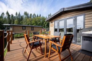 Μπαλκόνι ή βεράντα στο Ostseecamp Ferienhaus One Nineteen, mit Motorradgarage