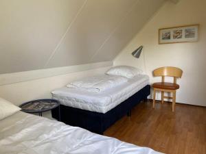 Katil atau katil-katil dalam bilik di Hello Zeeland - Vakantiehuis Zwin 182