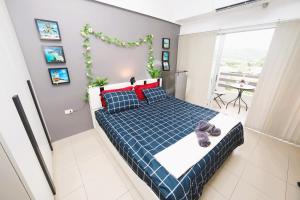 Postel nebo postele na pokoji v ubytování Beach front Apartment RAYONG CONDOCHAIN