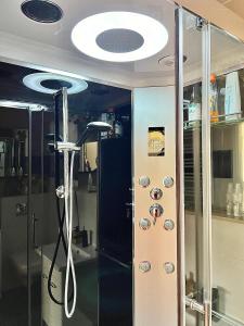 a bathroom with a shower with a shower head at Agroturystyka Parlińskie Wody I in Parlino +35 photos