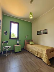 Posteľ alebo postele v izbe v ubytovaní Villa Castiglione