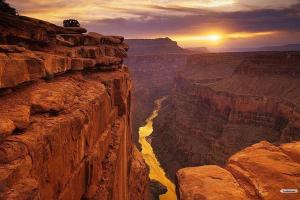 a view of the grand canyon at sunset at Jabal Shams, Al Noor house جبل شمس in Misfāh +14 photos