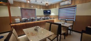 Predel za sedenje v nastanitvi Nandhavanam A Business Class Residency