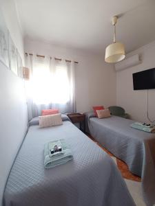 Postel nebo postele na pokoji v ubytování Gibraltar Views Guest House