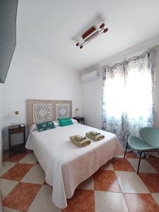Posteľ alebo postele v izbe v ubytovaní Gibraltar Views Guest House