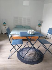 Voodi või voodid majutusasutuse MANOIR ST YVES -Gîte toas