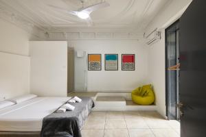 Posteľ alebo postele v izbe v ubytovaní Ella Hostel Gran Vía