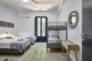 Posteľ alebo postele v izbe v ubytovaní Ella Hostel Gran Vía