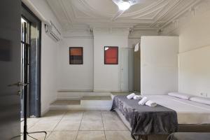 Posteľ alebo postele v izbe v ubytovaní Ella Hostel Gran Vía
