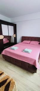 Ένα ή περισσότερα κρεβάτια σε δωμάτιο στο LC Apartments A-B 41