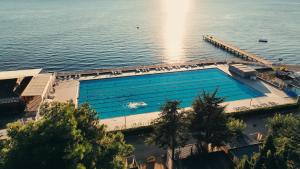 an overhead view of a swimming pool in the water at Villas - Hotel & Resort Adria Ankaran in Ankaran
