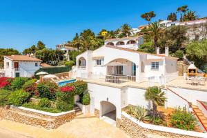 an aerial view of a white house at Villa Proa by Villa Plus in Alaior