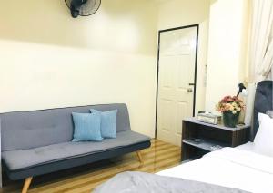 Кровать или кровати в номере MeeTHan 8 Chiang Mai