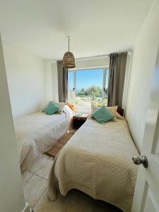 Letto o letti in una camera di Costa del Este