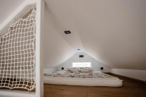 Postel nebo postele na pokoji v ubytování Glamping Osada