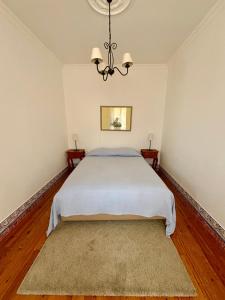 Postel nebo postele na pokoji v ubytování Casa da Villa 1B + 9 fotografií