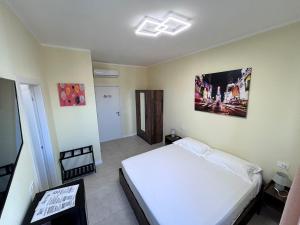 Postel nebo postele na pokoji v ubytování Urban Suite Milano