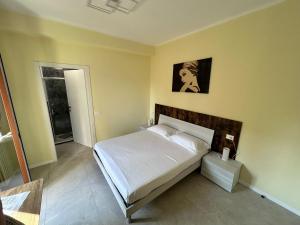 Postel nebo postele na pokoji v ubytování Urban Suite Milano