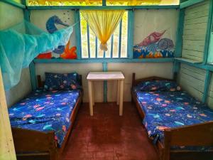 Voodi või voodid majutusasutuse Wira Pora Hostal toas
