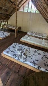 Voodi või voodid majutusasutuse Wira Pora Hostal toas