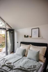 Postel nebo postele na pokoji v ubytování Glamping Osada