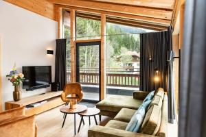 Televízia a/alebo spoločenská miestnosť v ubytovaní Gerlos Alpine Estate - Gerlos