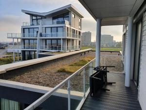 Balkón nebo terasa v ubytování Ferienwohnung Austernfischer Marina Wendtorf
