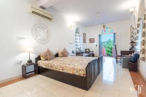 Katil atau katil-katil dalam bilik di AnandMai Heritage Homestay