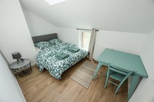 Postel nebo postele na pokoji v ubytování Grange Rénovée 5 personnes-Gîte Le 411