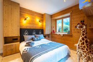 Ένα ή περισσότερα κρεβάτια σε δωμάτιο στο Chalet le 4 - numéro 1 +19 φωτογραφίες